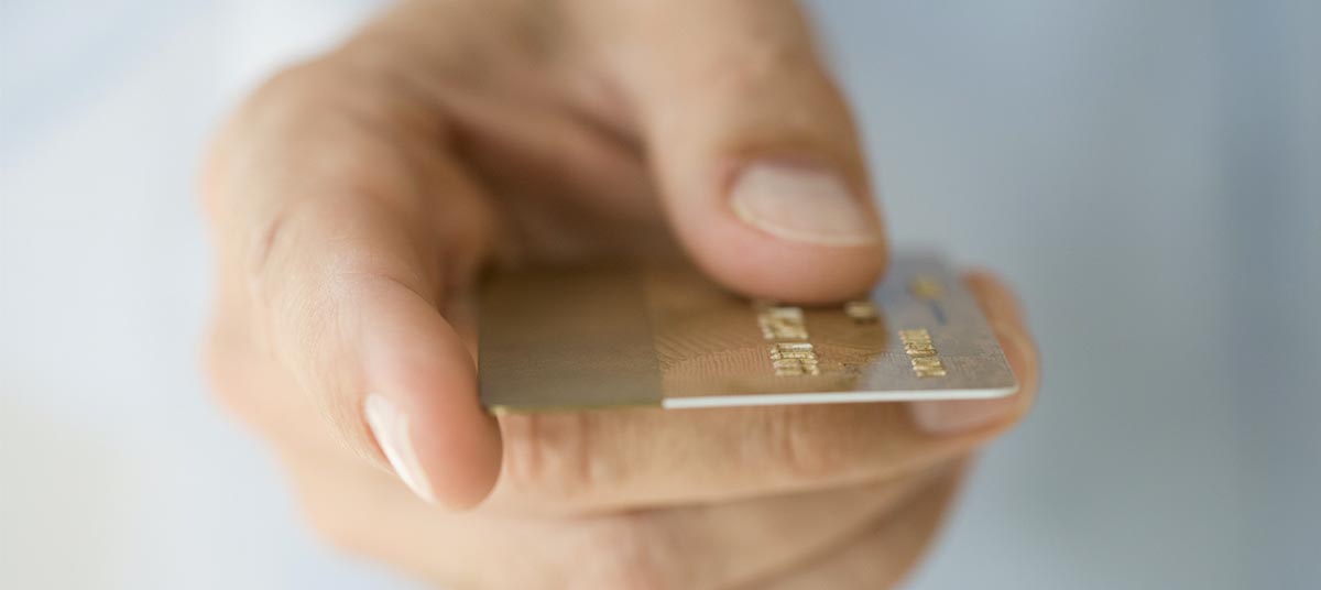 Close-up of hand with credit card