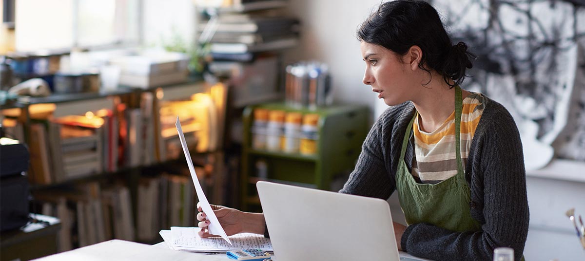 Creative workspace with focused woman