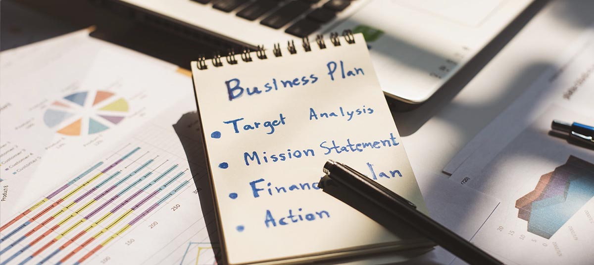 Planning and analysis documents on desk