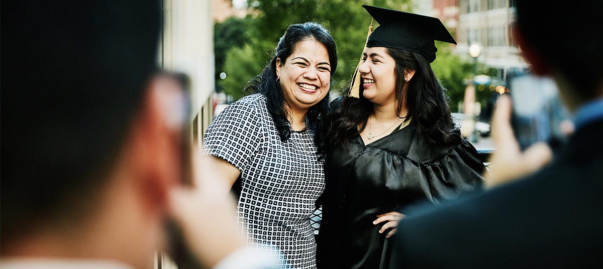 Happy graduate with family member