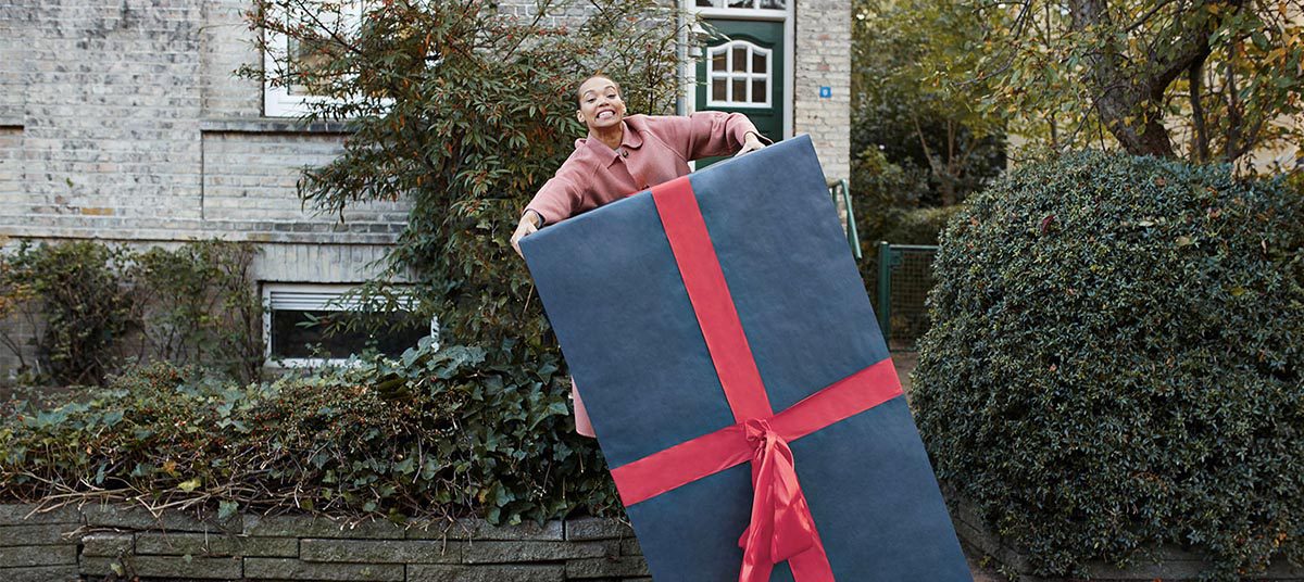 Large gift with red ribbon