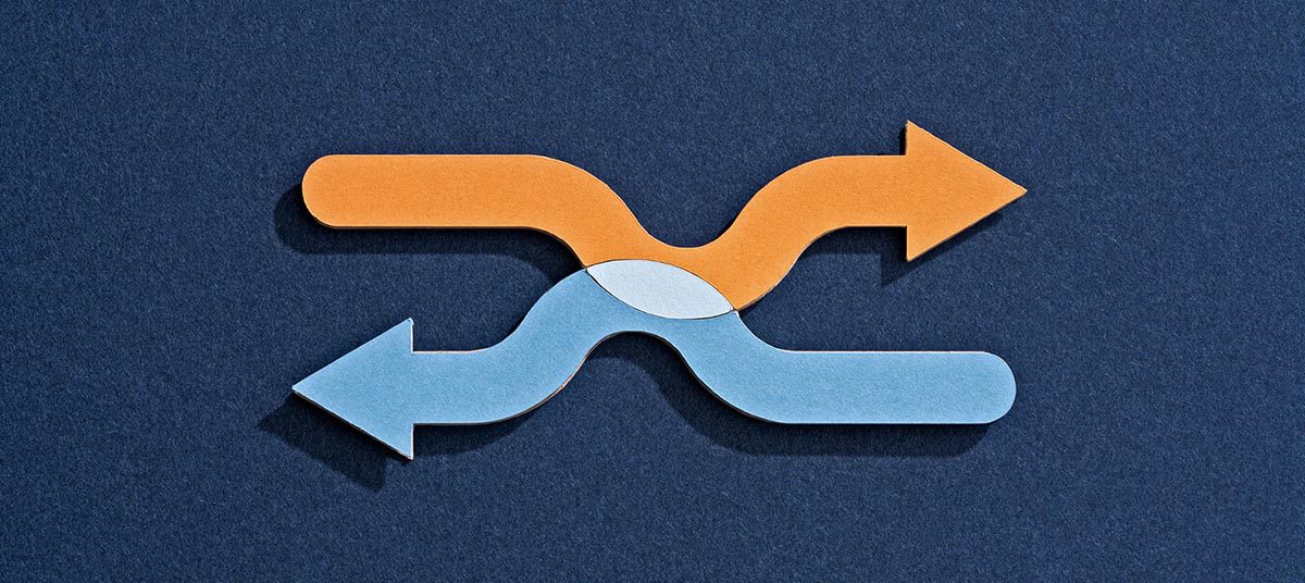 Crossed arrows symbolizing direction change