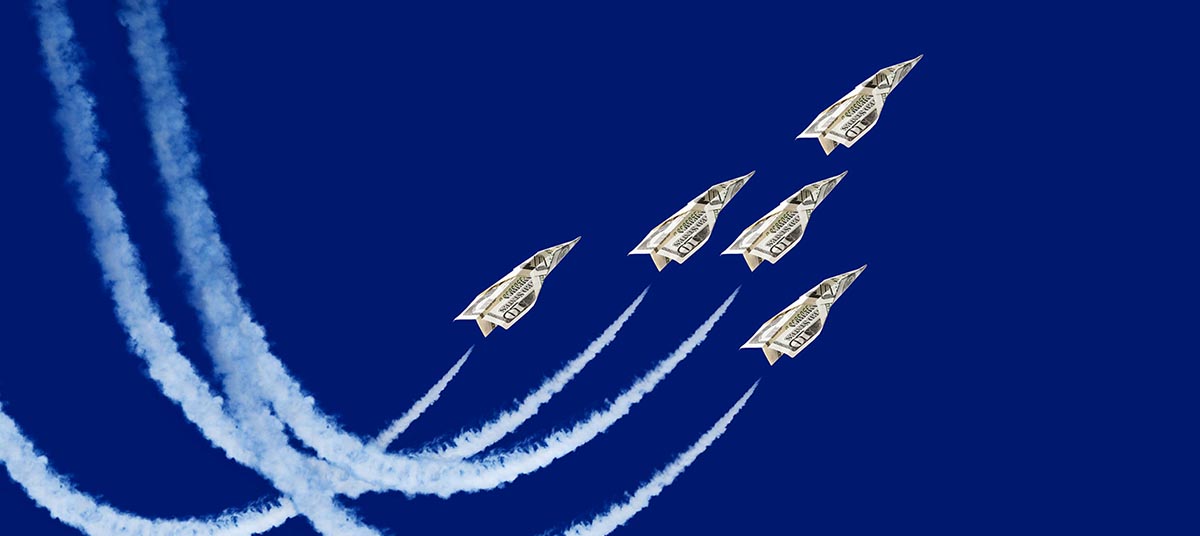 Jets made of dollar bills in flight
