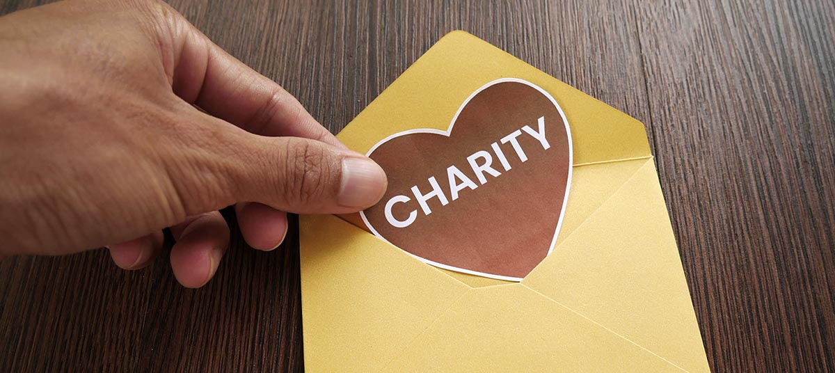 Donation envelope with charity heart sticker