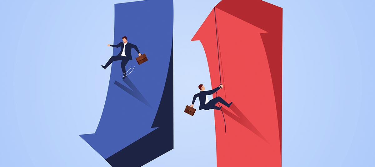 Businessmen on contrasting upward and downward trends