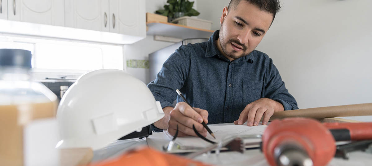 Engineer sketching in modern office space