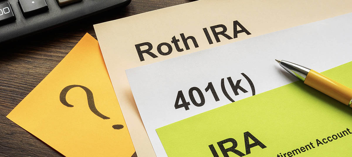 Retirement account papers and question mark