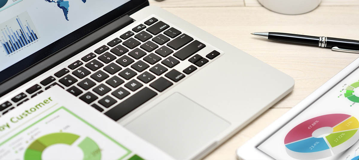 Office desk with analytics reports