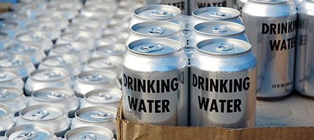 Silver cans labeled drinking water
