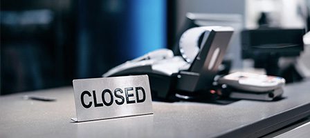 Closed sign on a counter