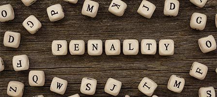Penalty spelled with wooden tiles