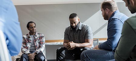 People engaged in a conversation circle