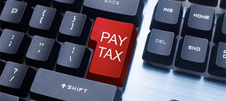 Red "Pay Tax" keyboard key
