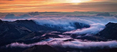 Clouds enveloping rugged mountain peaks