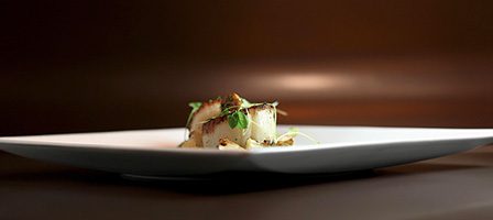 Elegant plated meal with microgreens