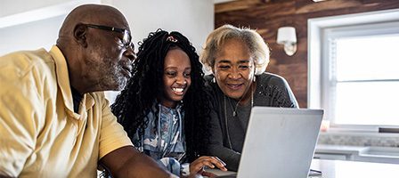 Multigenerational family enjoying online content