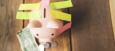 Saving money concept with piggy bank