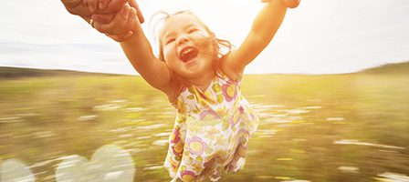 Joyful kid enjoying a sunny day
