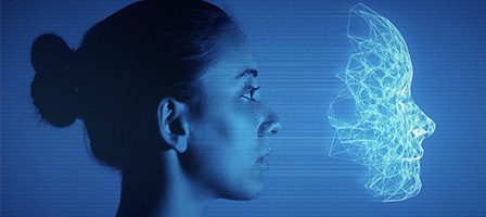 Profile of woman facing digital face