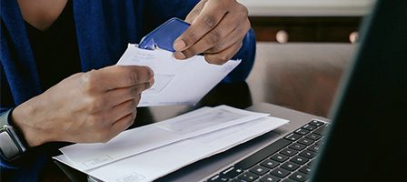 Opening mail with a letter opener