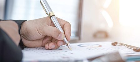 Hand writing on financial documents