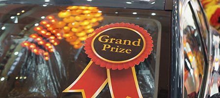 Grand prize ribbon on car windshield