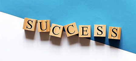 Success word on blue background