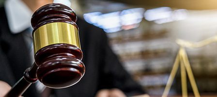 Wooden gavel and scales