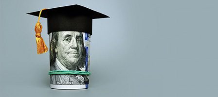 Money roll wearing graduation cap