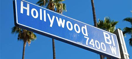 Blue Hollywood Blvd sign under clear sky