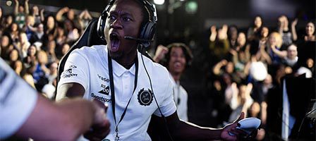 Excited player with headset in competition