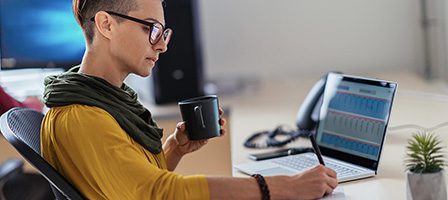 Professional focused on computer screen